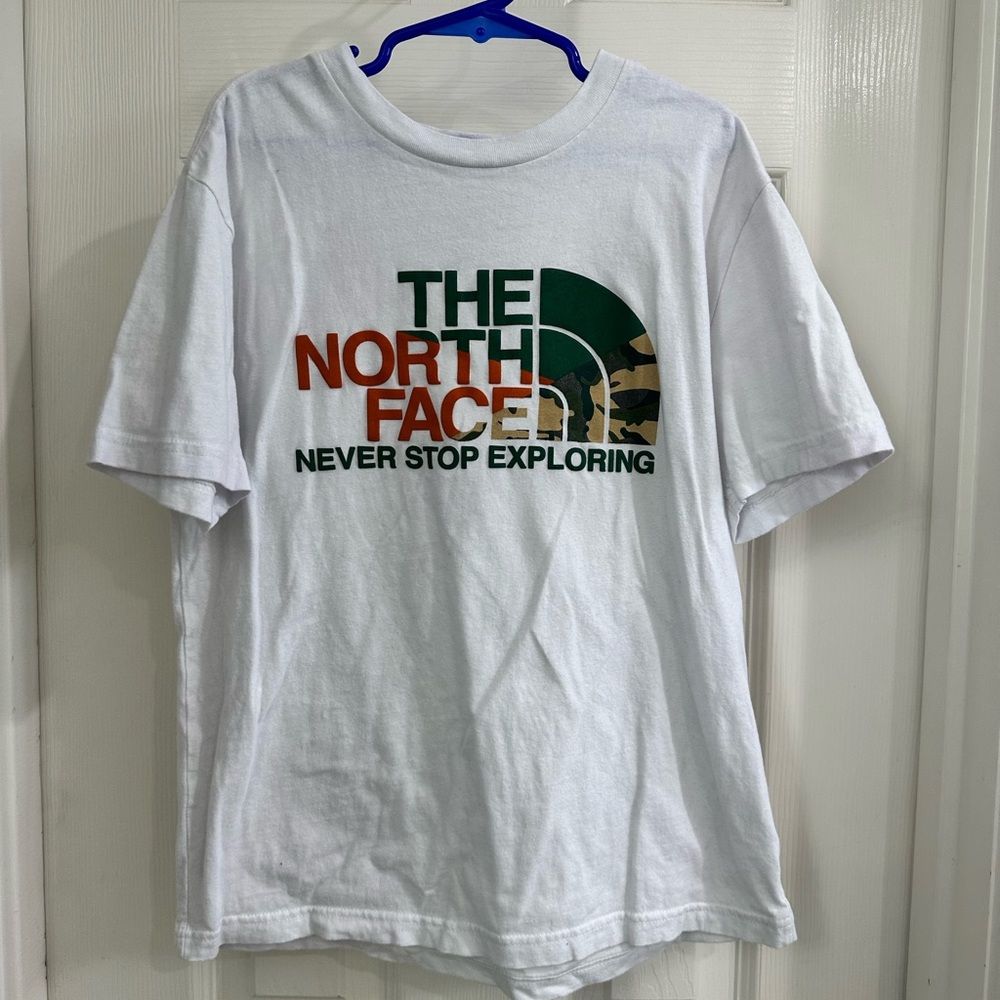 The North Face T-shirt size M (10/12)